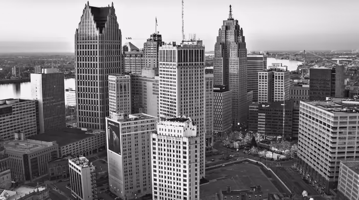 The Detroit riverfront skyline at sunrise.